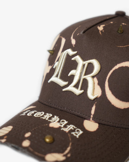 OVERDYED INITIAL CHOCOLATE CAP