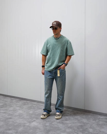 DISTRESSED FLARE JEANS